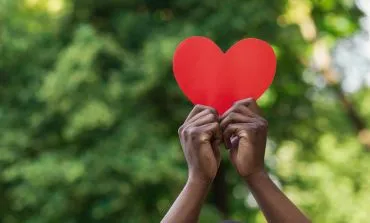 Hands holding a heart
