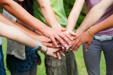Community hands together