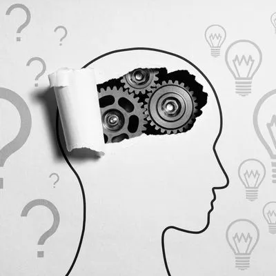 Paper head with gears inside, surrounded by question marks and light bulbs